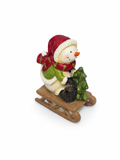 BONECO DE NEVE EM CERÂMICA SENTADO ESQUIANDO 13,8CM